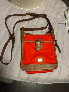 Dooney & Bourke Nylon Crossbody with Brown Leather Trim.